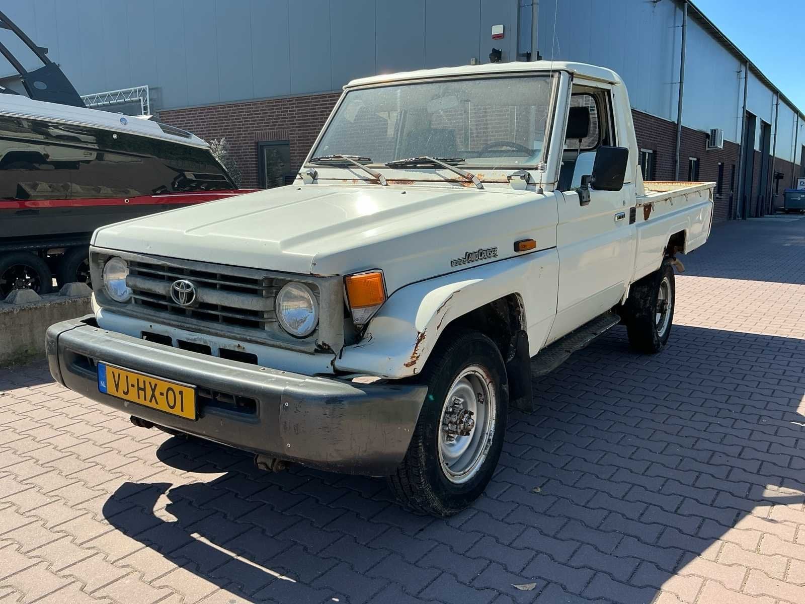 Toyota Land Cruiser Heavy Duty 4.2 Pick-up Bedrijfswagen Ori, Auto's, Overige merken, Origineel Nederlands, Bedrijf, Vierwielaandrijving
