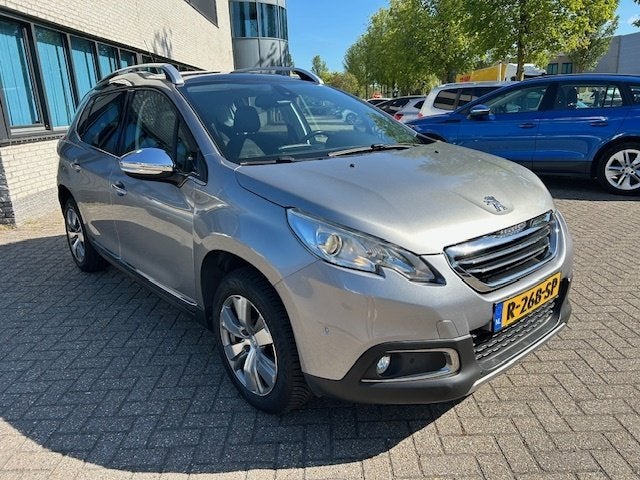 Peugeot 2008 1.2 PureTech Allure PANO CLIMA NAVI CRUISE, Auto's, Euro 5, 1199 cc, 82 pk, Leder en Stof
