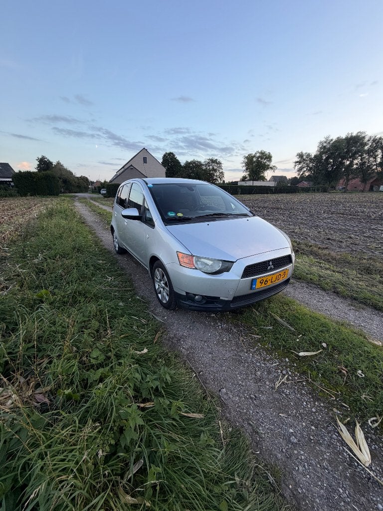 Mitsubishi Colt 1.3 5-DR 2010 Grijs, Auto's, Voorwielaandrijving, Stof, Colt, Origineel Nederlands