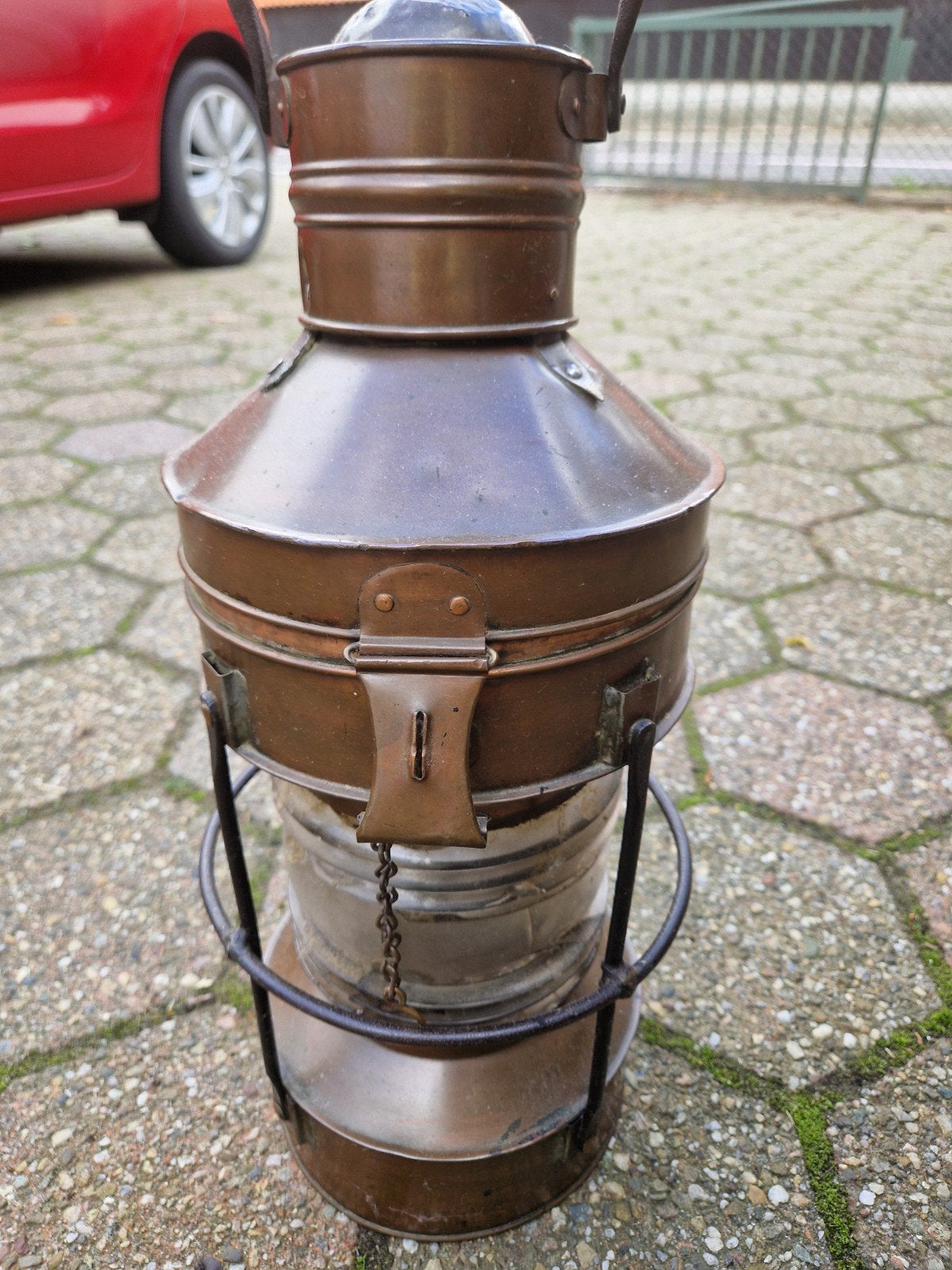 Antieke scheepslamp met olielamp, Ophalen