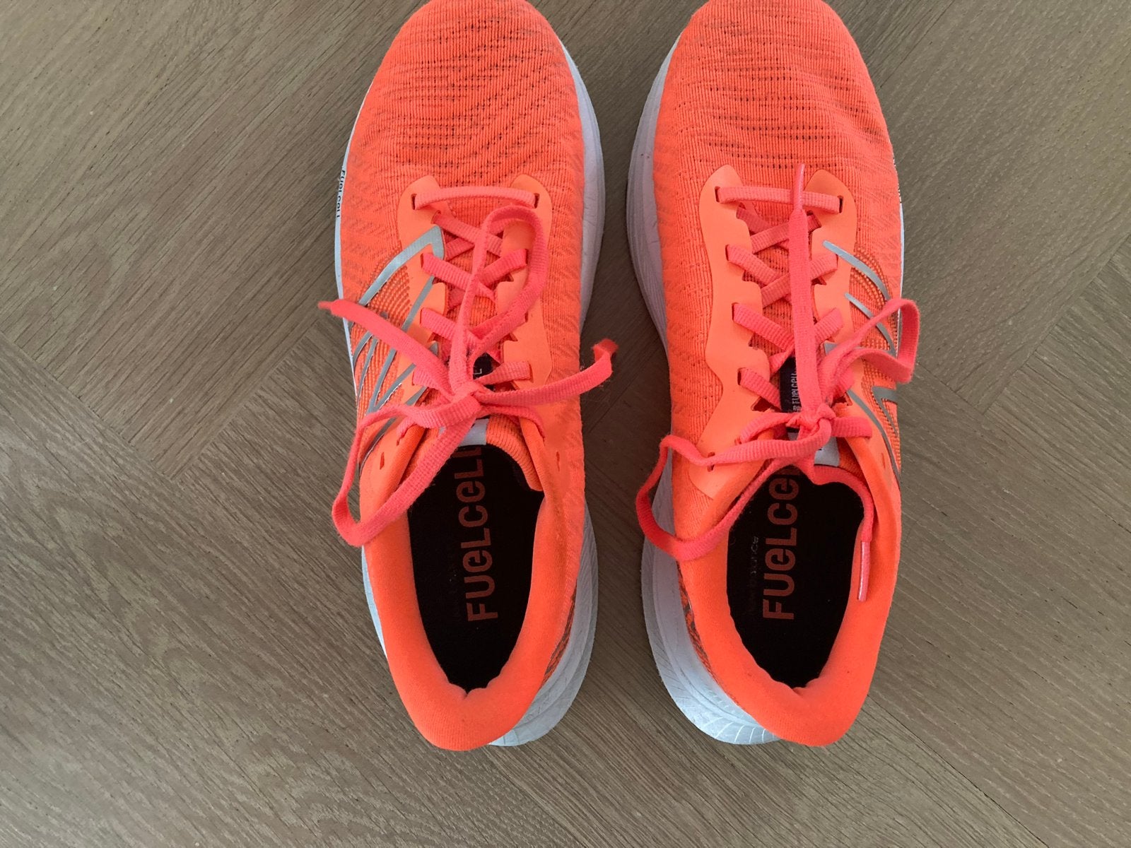 New Balance FuelCell hardloopschoenen - Oranje, Ophalen of Verzenden, Sneakers of Gympen, Roze, Gedragen