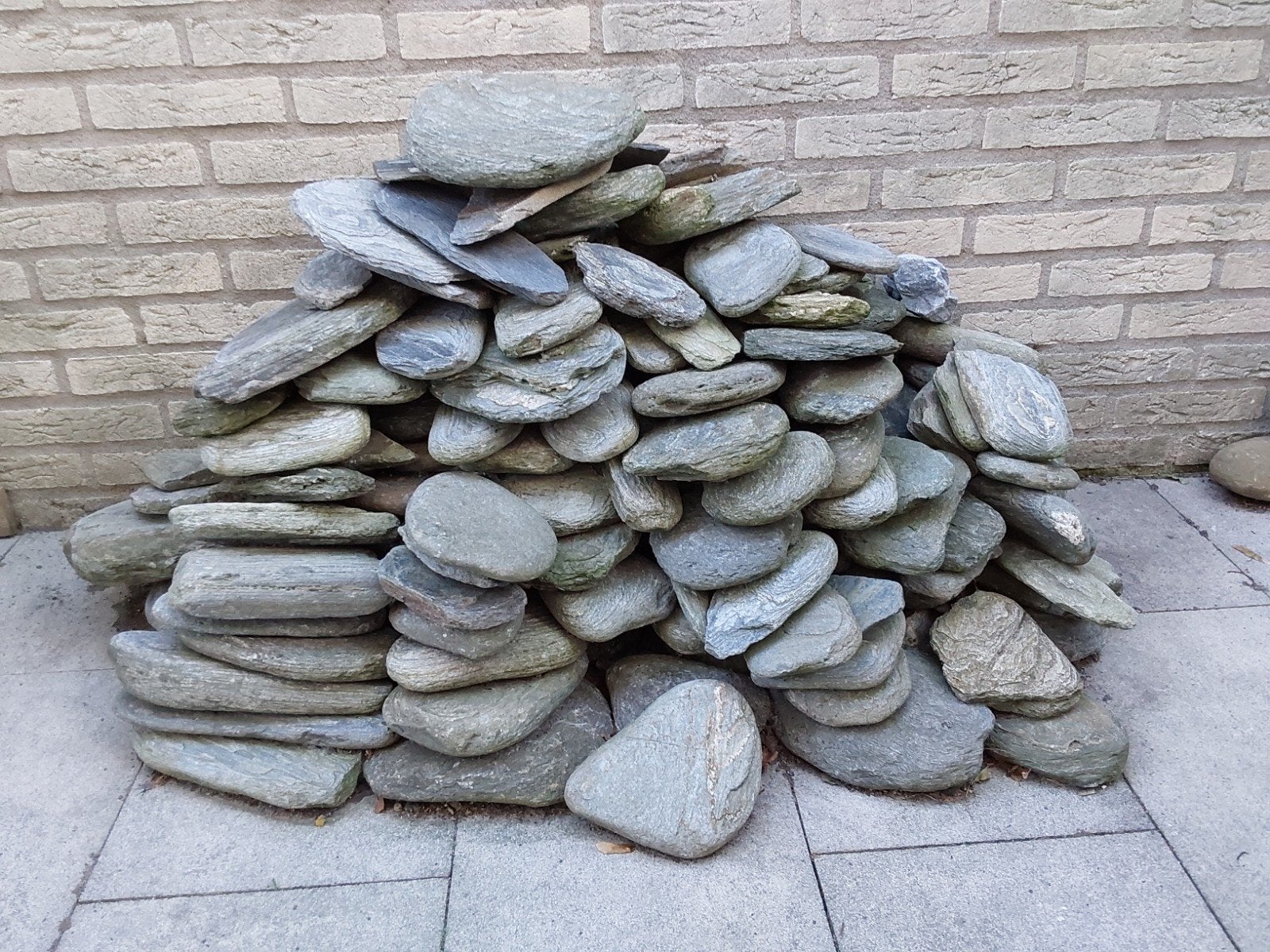 groot aantal fylliet / schist sierstenen, Ophalen