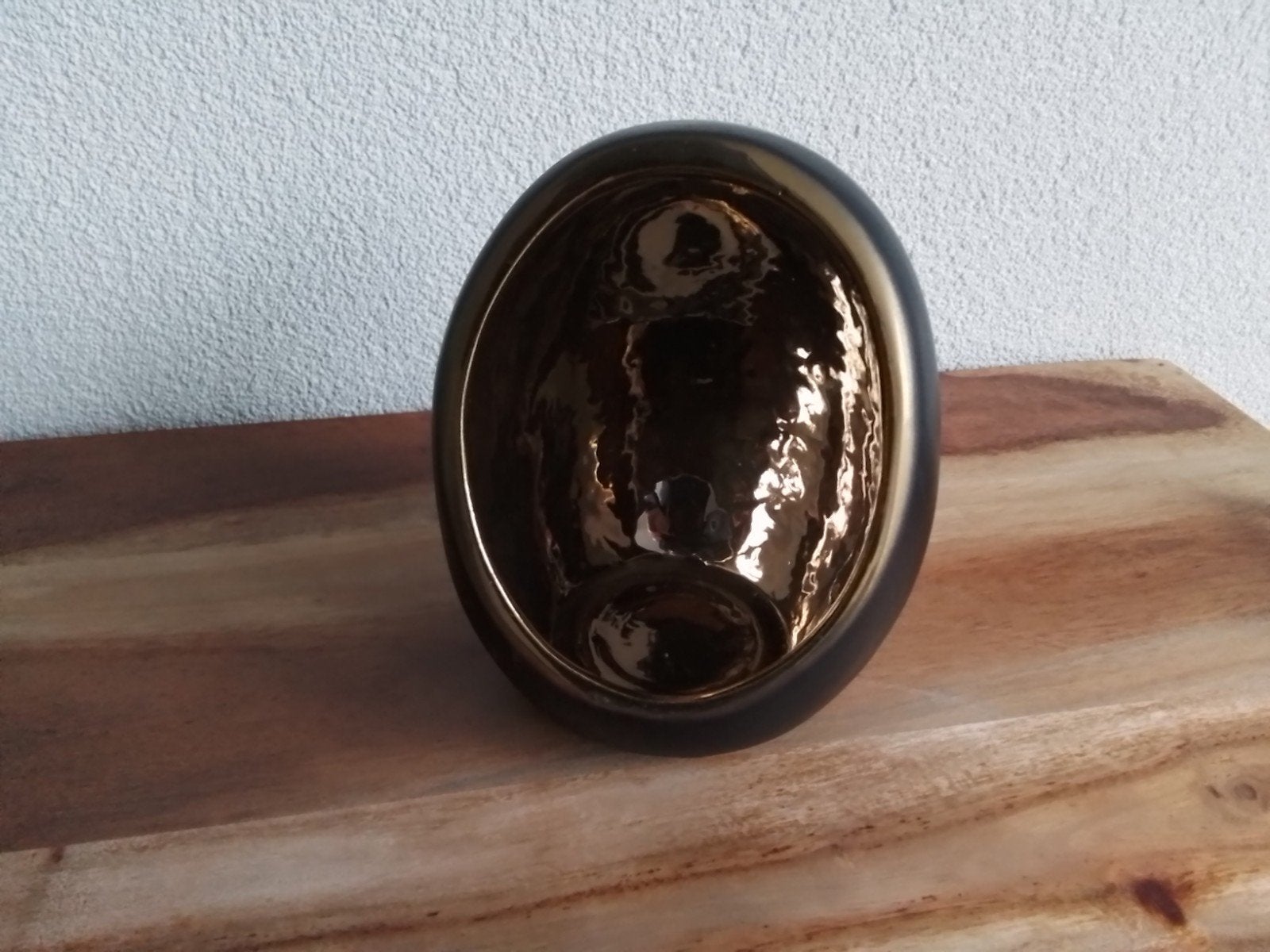 Keramieke waxinelichthouder ei zwart met goud
15 cm hoog, Ophalen of Verzenden, Zo goed als nieuw, Zwart
