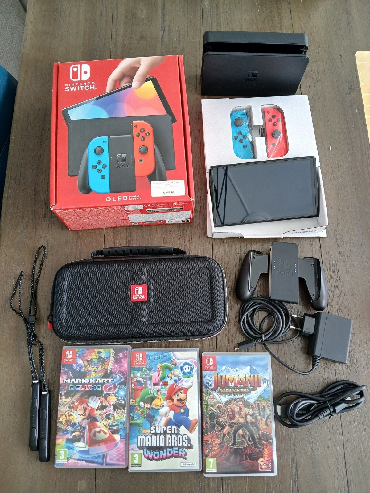 Nintendo Switch OLED met 3 games en accessoires