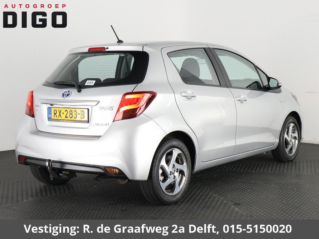 Toyota Yaris 1.5 Hybrid Trend | Navigatie | Camera | Trekhaa, Gebruikt, 4 cilinders, 49 €/maand, Bedrijf