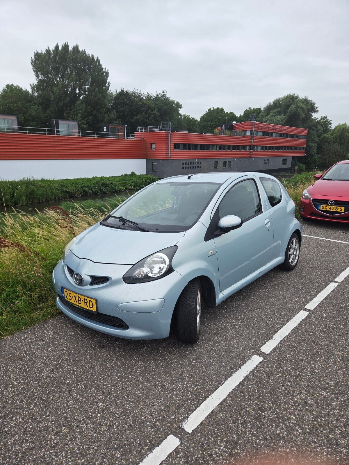Toyota Aygo 1.0 12V Vvt-i 3DRS MMT 2007 Blauw, Auto's, Voorwielaandrijving, Stof, Zwart, 68 pk