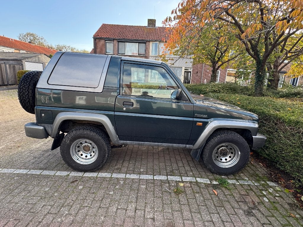 Daihatsu Feroza 1.6 Cabriotop 4WD 1997 Groen, Auto's, Feroza, 1590 cc, Origineel Nederlands, Handgeschakeld
