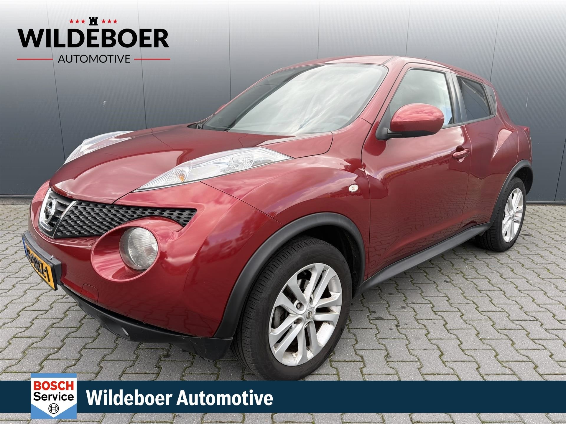 Nissan Juke 1.6 117 PK Acenta NAVI + CLIMA + CRUISE + CAMERA, Auto's, 607 kg, Euro 5, Stof, Zwart