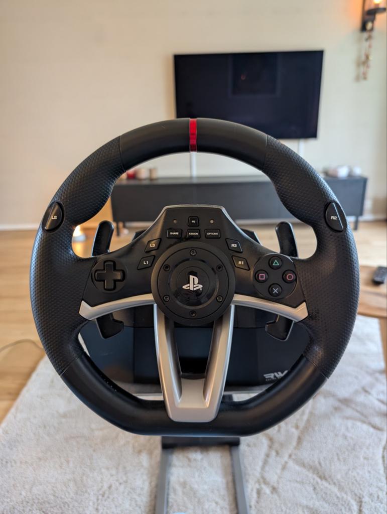 PlayStation racestuur met playseat stang voor op bank, Ophalen of Verzenden, Gebruikt, Stuur of Pedalen, PlayStation 4