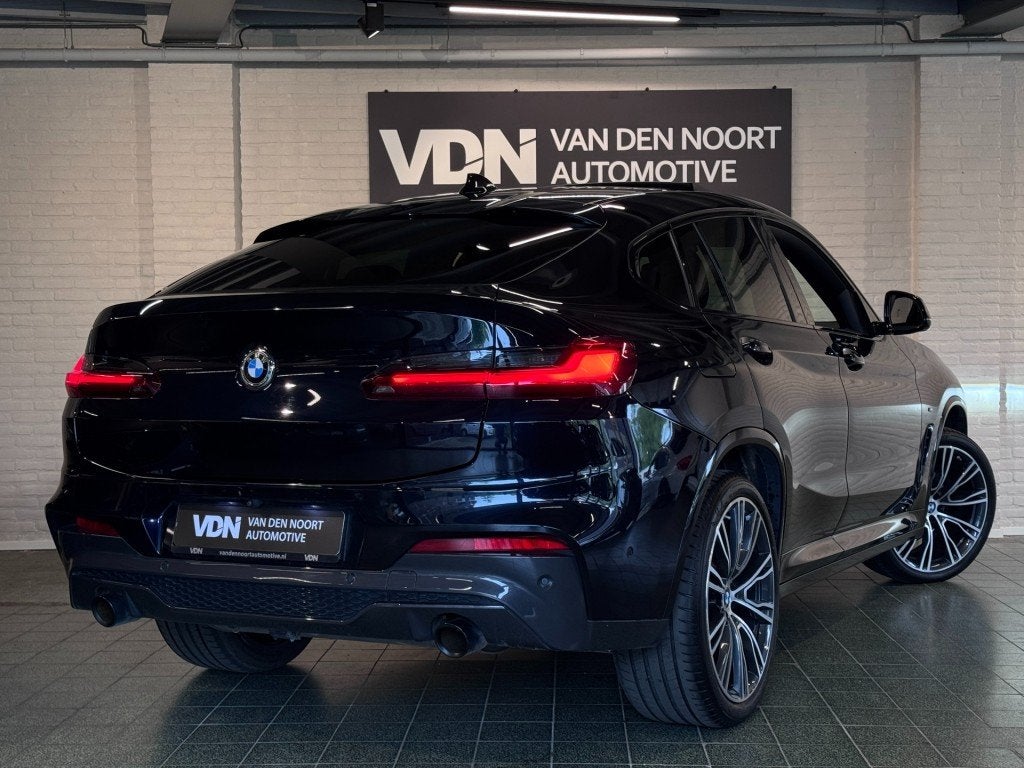 Bmw X4 xDrive20i High Executive M-Sport Pano Camera Trekhaak, Automaat, Gebruikt, 4 cilinders, Zwart