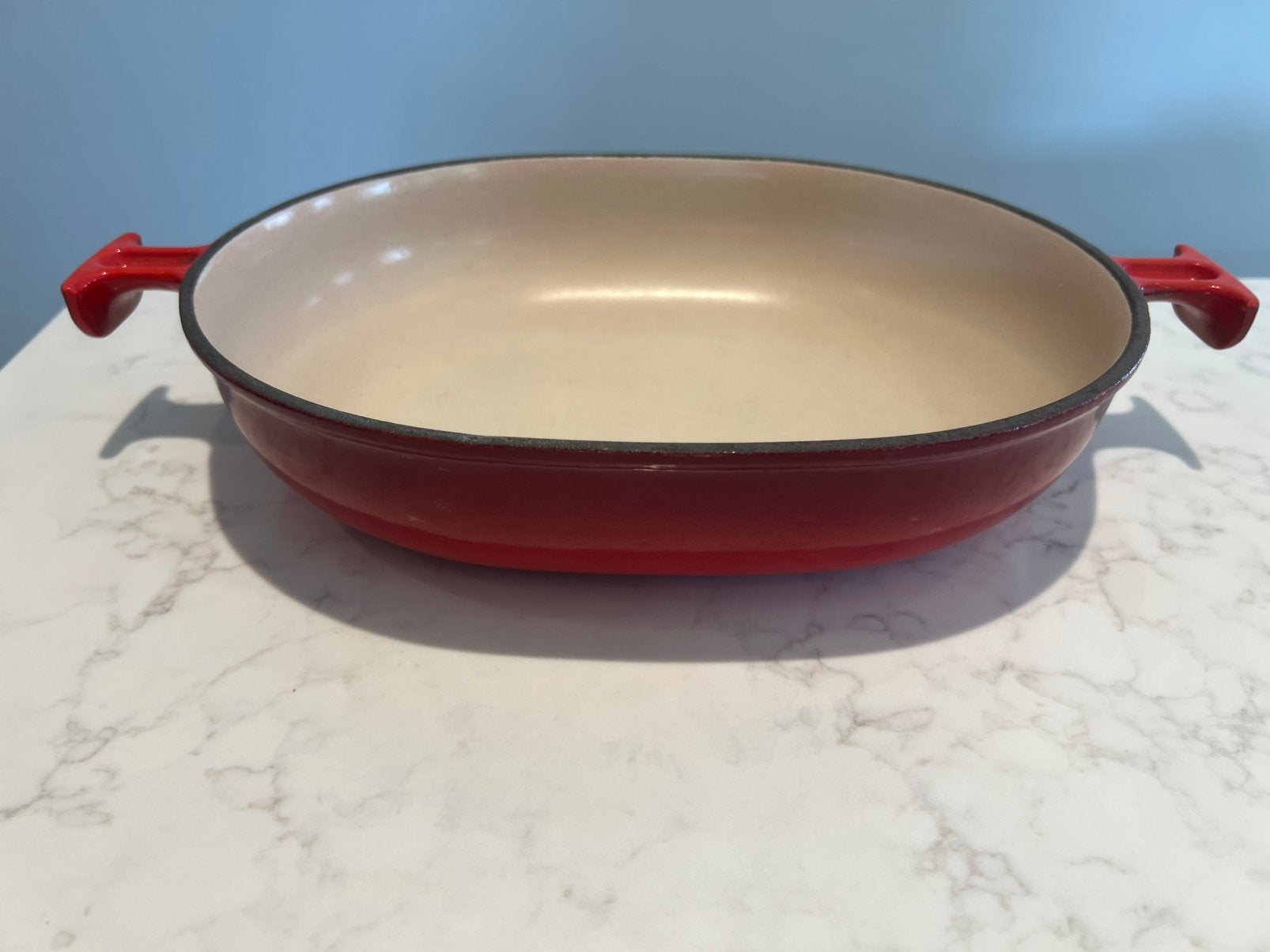 Le Creuset La Mama 29 cm ovenschaal Cerise in goede staat, Gietijzer, Overige typen, Le Creuset, Ophalen of Verzenden
