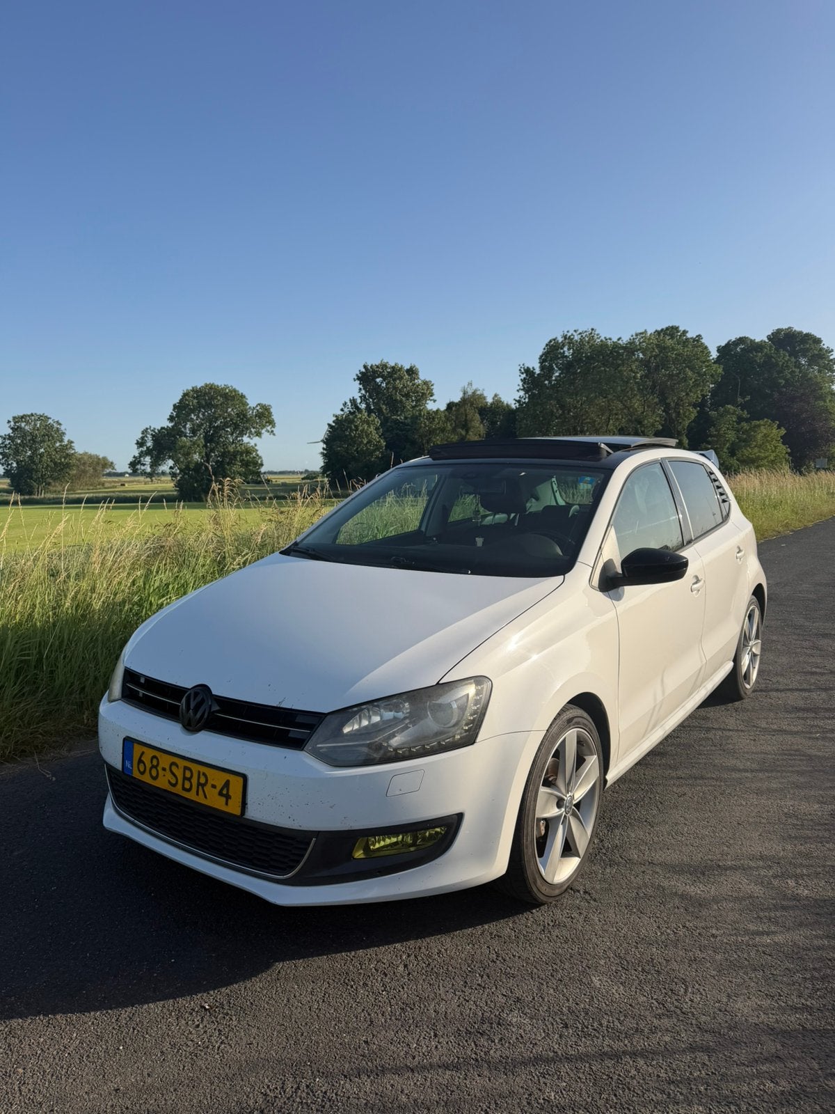 Volkswagen Polo 1.2 TSI 77KW DSG 2011 Wit, Auto's, Volkswagen, 40 €/maand, 4 cilinders, Wit, Origineel Nederlands