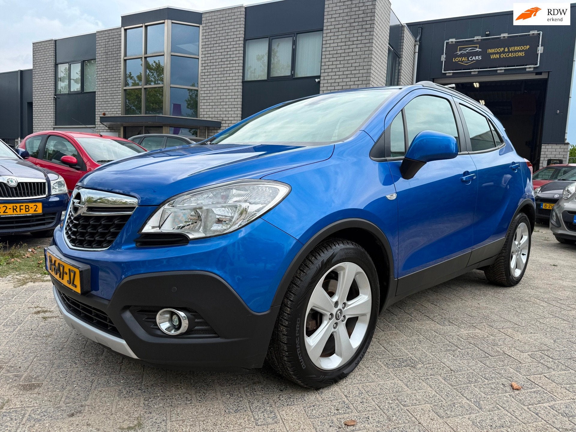 Opel Mokka 1.4 T Cosmo 4x4 Airco Trekhaak Cruise Control, Auto's, Opel, Euro 5, Gebruikt, Zwart, 4 cilinders