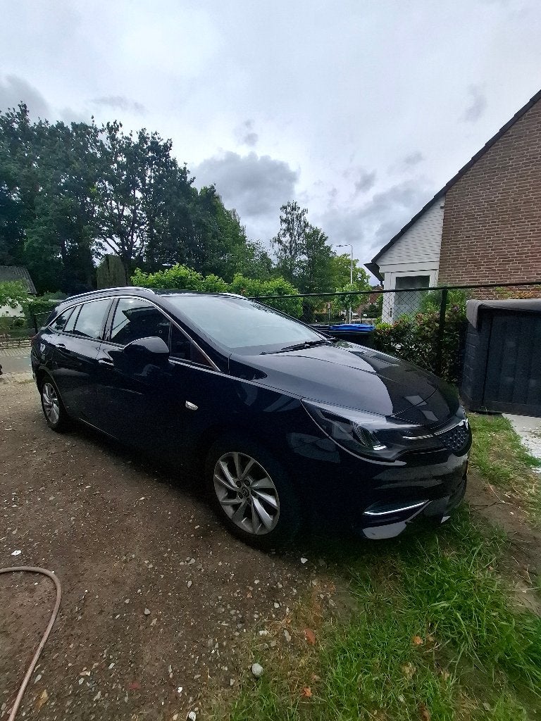 Opel Astra 1.2 Turbo 110pk 2021 Zwart weinig kilometers!!!, Auto's, Voorwielaandrijving, 1199 cc, Leder en Stof, Zwart