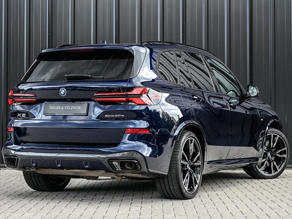 BMW X5 xDrive50e | M-Sport Pro | Panoramadak | Active Cruise, Auto's, BMW, Gebruikt, 2395 kg, Blauw, 489 pk