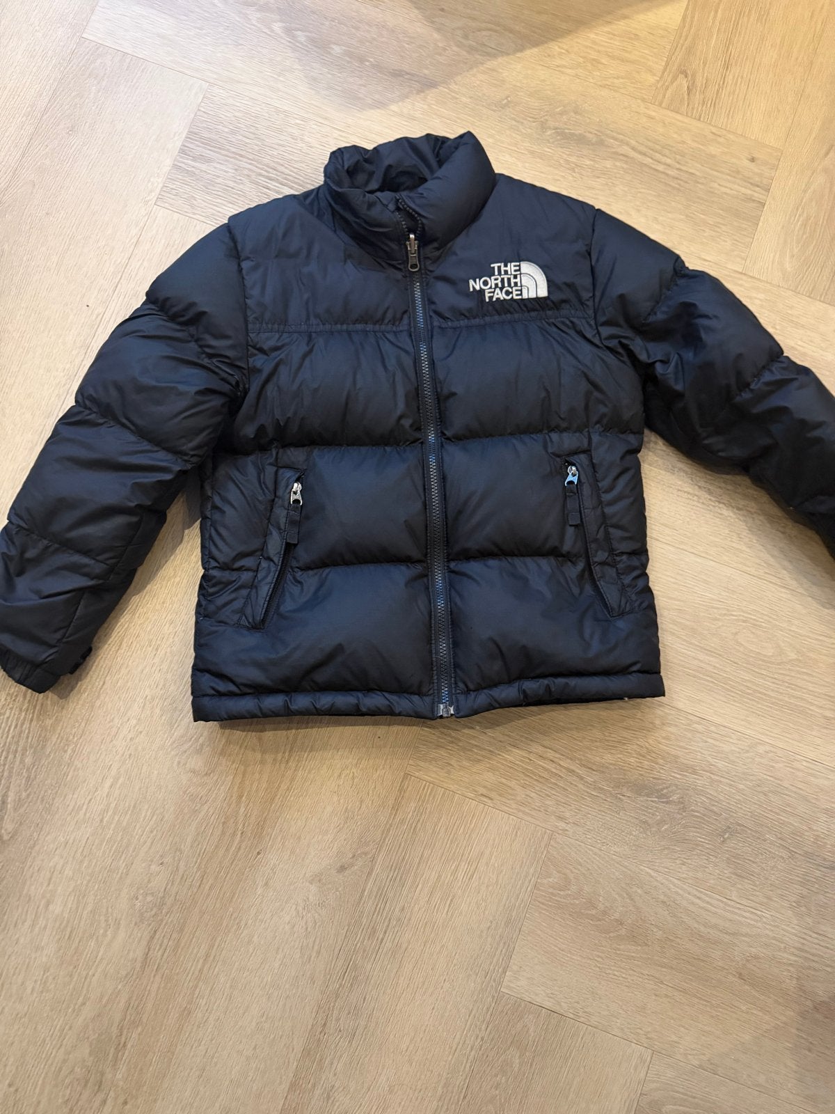 The North Face kinderjas zwart, maat 128, Ophalen of Verzenden, Zo goed als nieuw, Jongen of Meisje