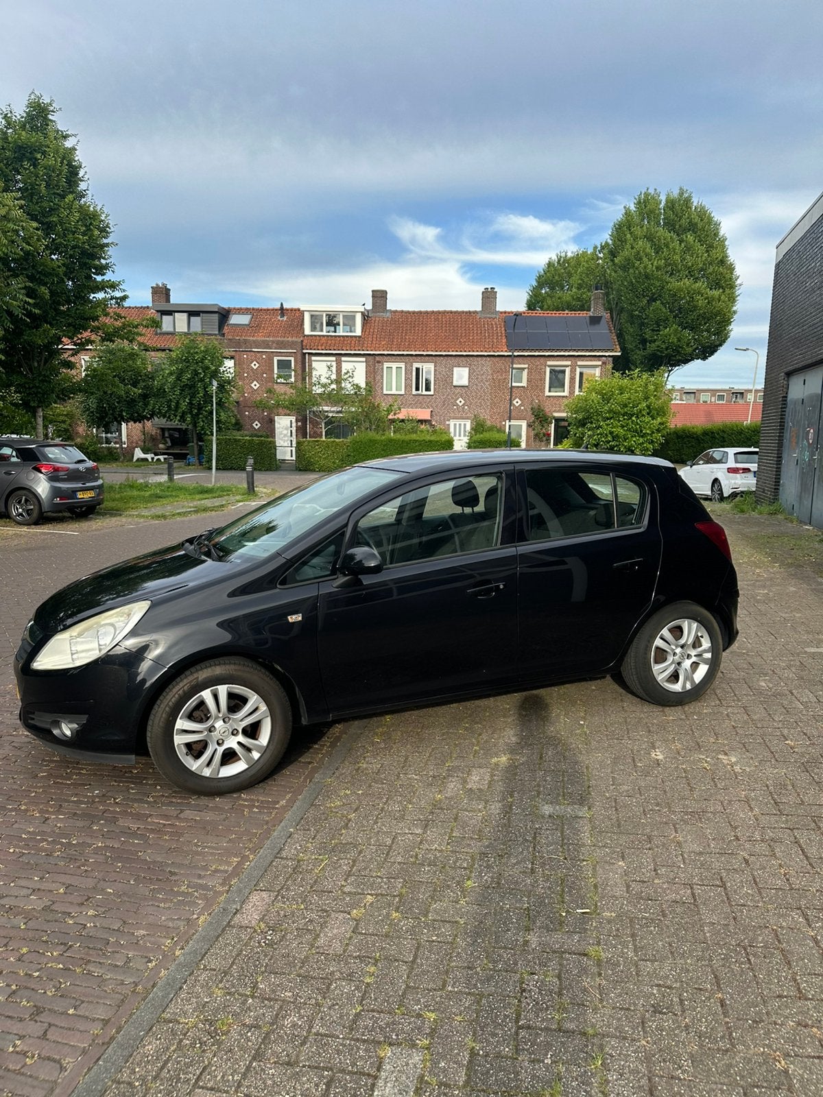 Opel Corsa 1.4 16V 5D 2009 Zwart, Auto's, Voorwielaandrijving, 1063 kg, 4 cilinders, Origineel Nederlands