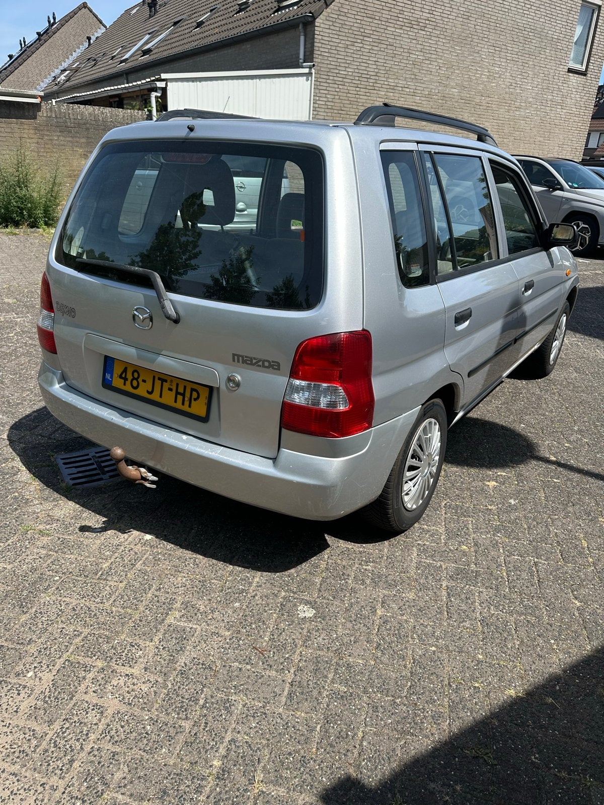 Mazda Demio 1.5 Exclusive 2002 Grijs, Auto's, Mazda, Voorwielaandrijving, 410 kg, 31 €/maand, Handgeschakeld
