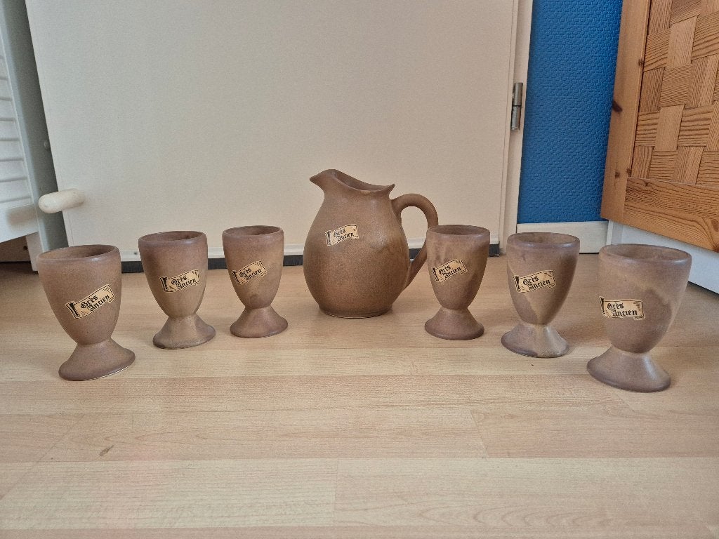 Aardewerk karaf met 6 bekers, Ophalen