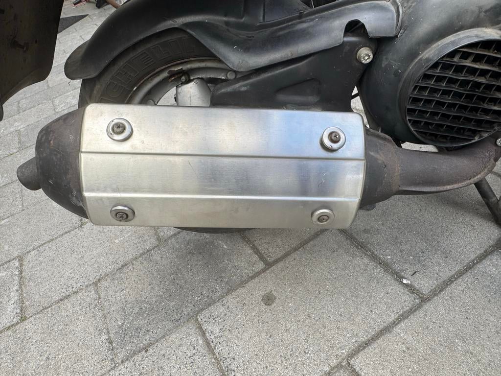 Sm06 met rvs voorbocht, Fietsen en Brommers, Brommeronderdelen | Scooters, Gebruikt, Piaggio, Uitlaat, Ophalen of Verzenden
