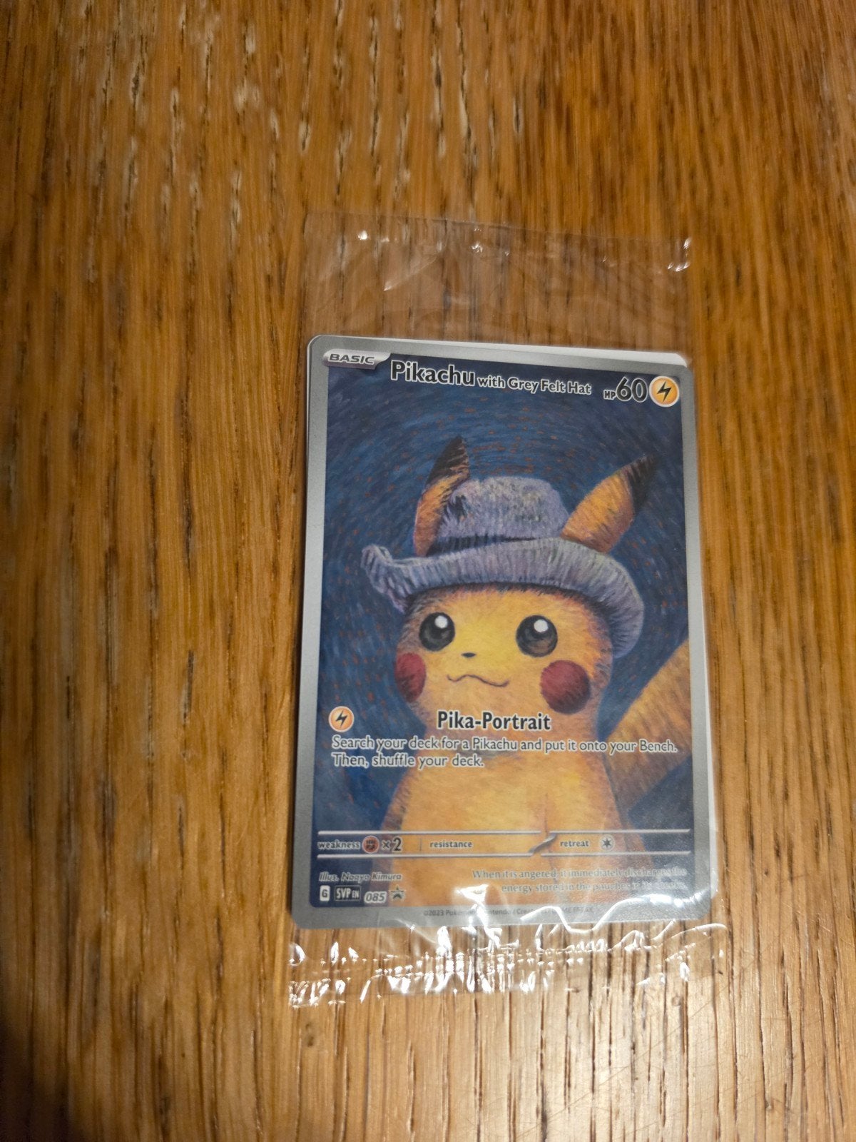 Pokémon Pikachu with Grey Felt Hat – SVP 085, Ophalen, Nieuw, Losse kaart, Foil