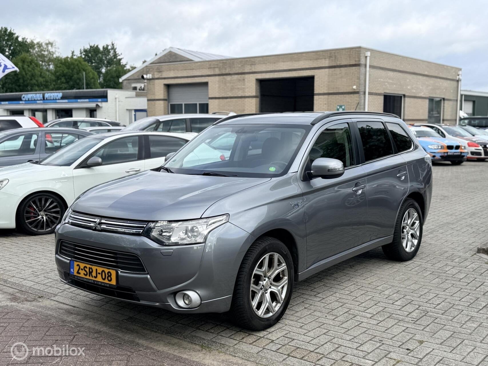 Mitsubishi Outlander 2.0 PHEV Instyle, Auto's, Mitsubishi, 4 cilinders, Bedrijf, Vierwielaandrijving, Hybride Elektrisch/Benzine