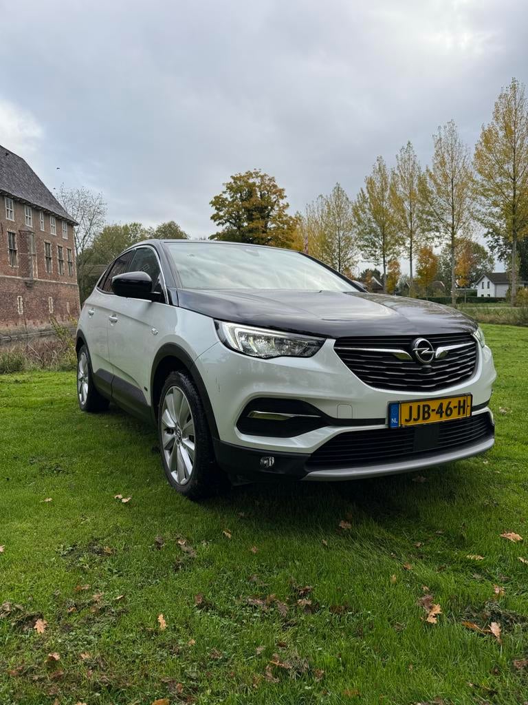 Opel Grandland X 1.6 Turbo Hybrid4 300pk 4x4 Aut 2020 Wit, Auto's, Opel, Automaat, 1250 kg, Wit, Bedrijf