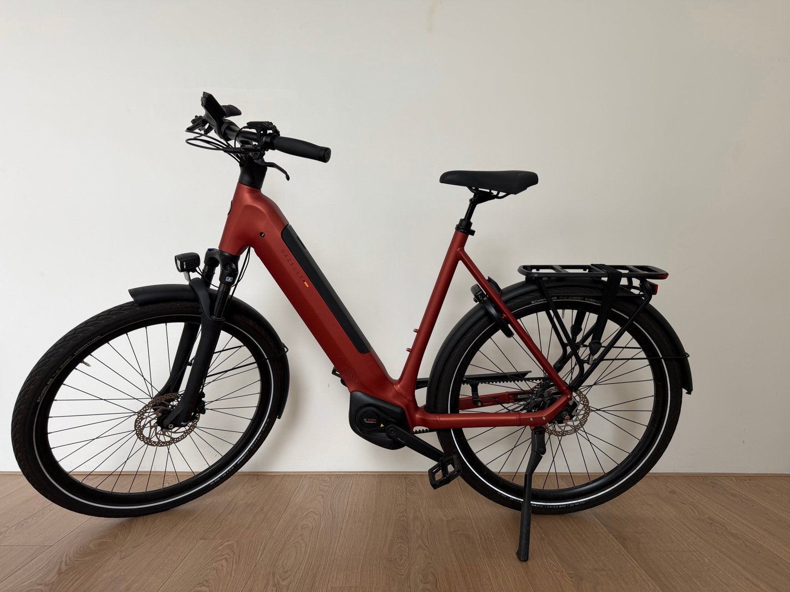 Gazelle Ultimate C5+ E-bike - Metallic Orange Mat, Ophalen, Zo goed als nieuw, 59 cm of meer, 50 km per accu of meer