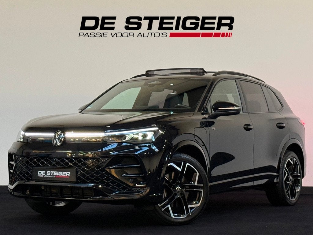 Volkswagen Tiguan 1.5 eHybrid 3 x R-Line Black Style 272 PK, Auto's, Zwart, Met garantie (alle), Zwart, Hybride Elektrisch/Benzine