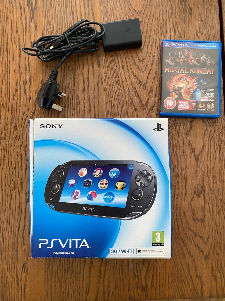 Sony PlayStation Vita (PCH-1103 met OLED) + Mortal Kombat, Ophalen, Zo goed als nieuw, Zwart, Met games