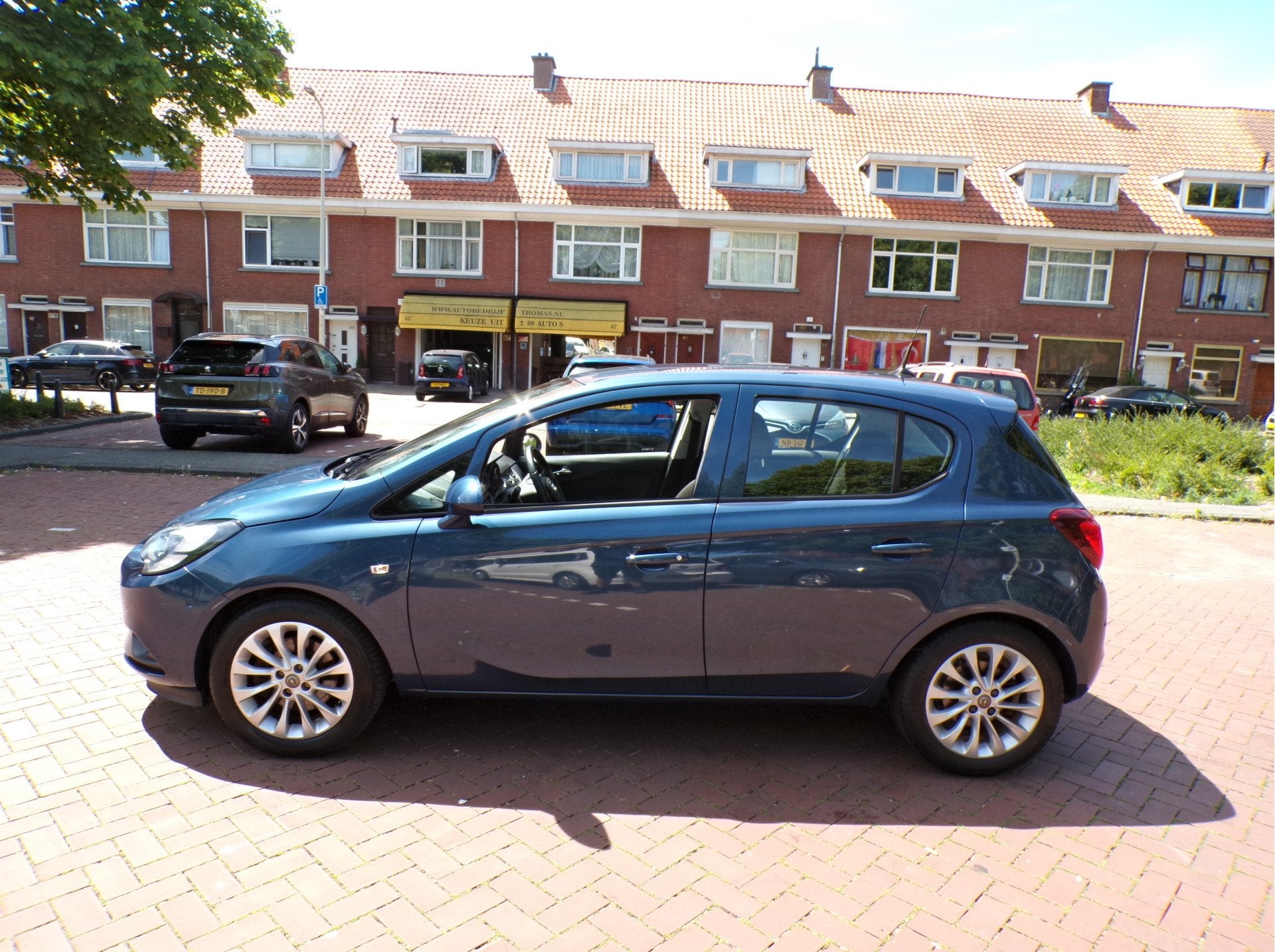 Opel Corsa 1.0 Turbo Edition CAMERA NAVI TEL CRUISECONT....., Auto's, Voorwielaandrijving, Gebruikt, Euro 6, Blauw