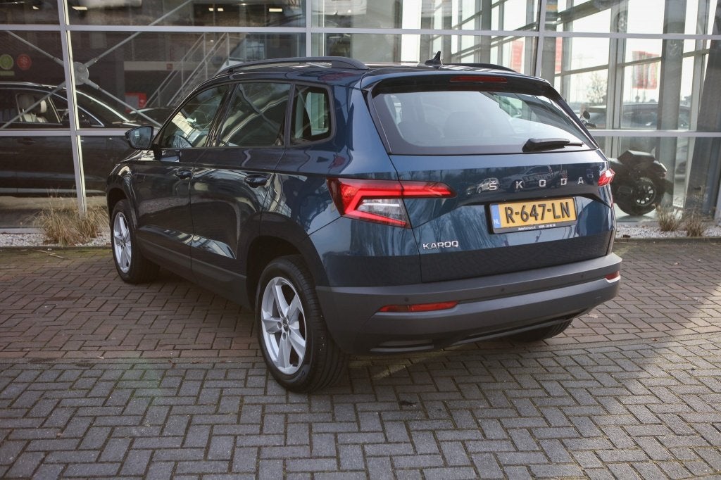 Skoda Karoq 1.0 TSI Bus. Ed. (bj 2021), Auto's, Skoda, Voorwielaandrijving, Gebruikt, Euro 6, Automatische klimaatregeling