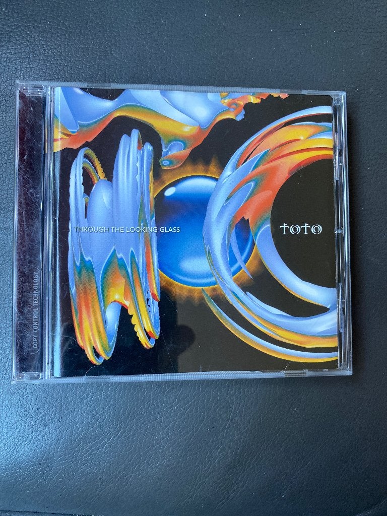 Toto - Through the Looking Glass CD, Cd's en Dvd's, Cd's | Rock, Ophalen of Verzenden, Zo goed als nieuw, Classic Rock