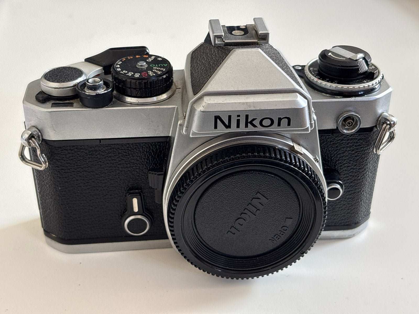 Nikon FE Spiegelreflexcamera - Lichtsensor defect, Audio, Tv en Foto, Fotocamera's Analoog, Ophalen of Verzenden, Niet werkend
