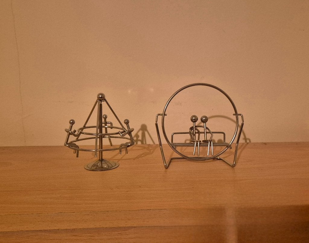 2 metalen kinetische balansspeeltjes, Ophalen of Verzenden, Zo goed als nieuw