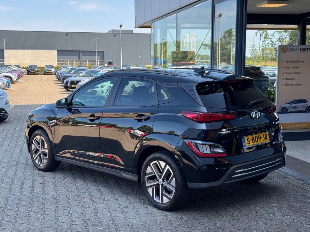 Hyundai Kona EV 64kWh Premium - Navi - camera - stoel/stuur, 12 maanden, 14 kWh, Gebruikt, Zwart