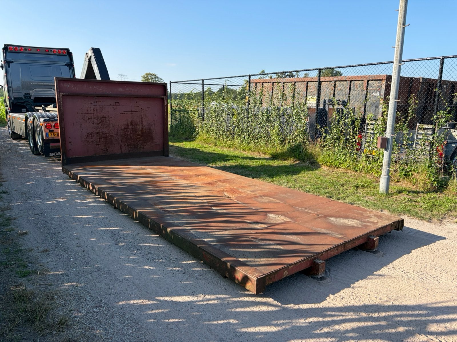 Container laadvloer, Ophalen