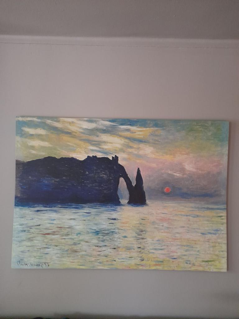 Claude Monet 'Zonsondergang bij Étretat', Ophalen