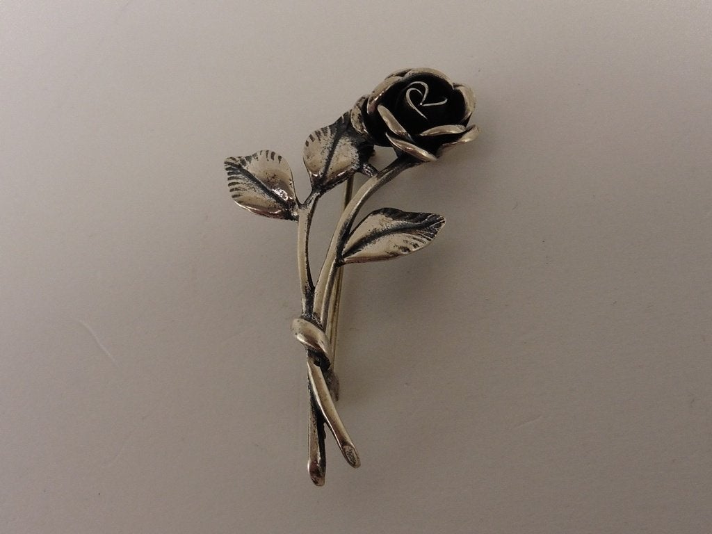 Zilveren Teka broche roosje                              Z79