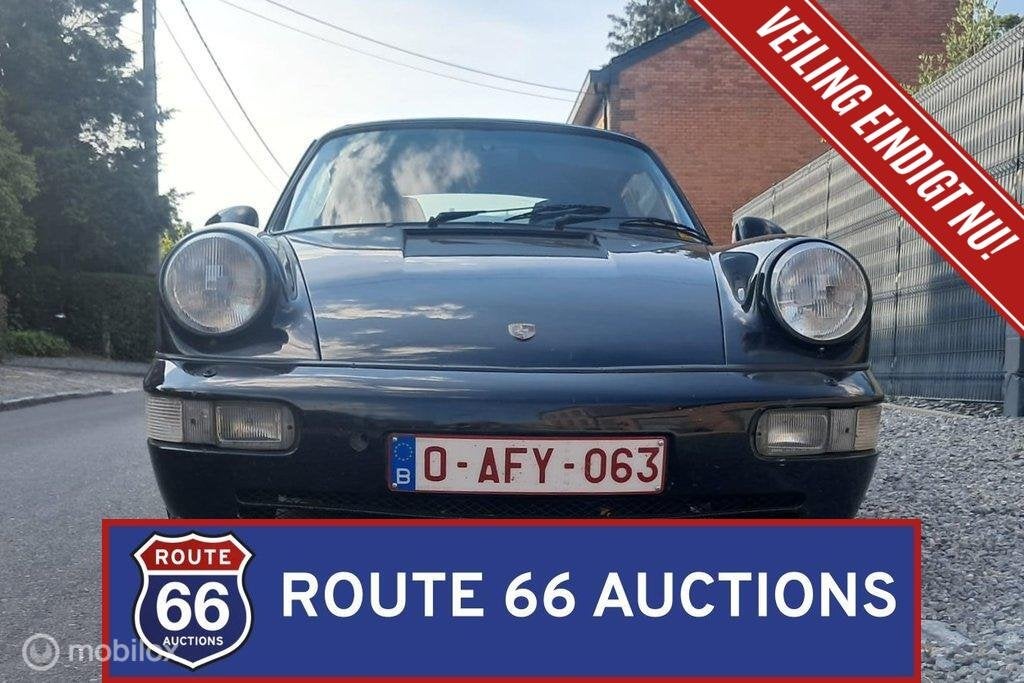 Porsche 911 Carrera Cabriolet | 1986 | Route 66 Auctions, Auto's, Oldtimers, Overige carrosserieën, Zwart, Bedrijf, Porsche