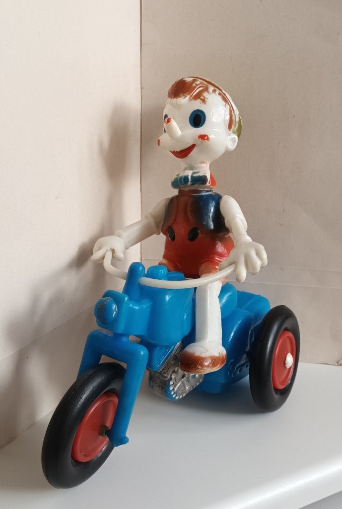 Vintage Buratino plastic Pinokkio op motorfiets pinocchio, Ophalen of Verzenden