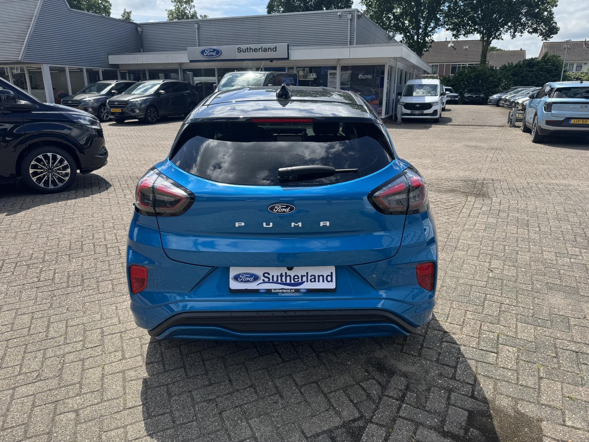 Ford Puma Gen-E Premium 44 kWh 168pk | Driver Assistance Pac, Blauw, Leder en Stof, 44 kWh, Geïmporteerd