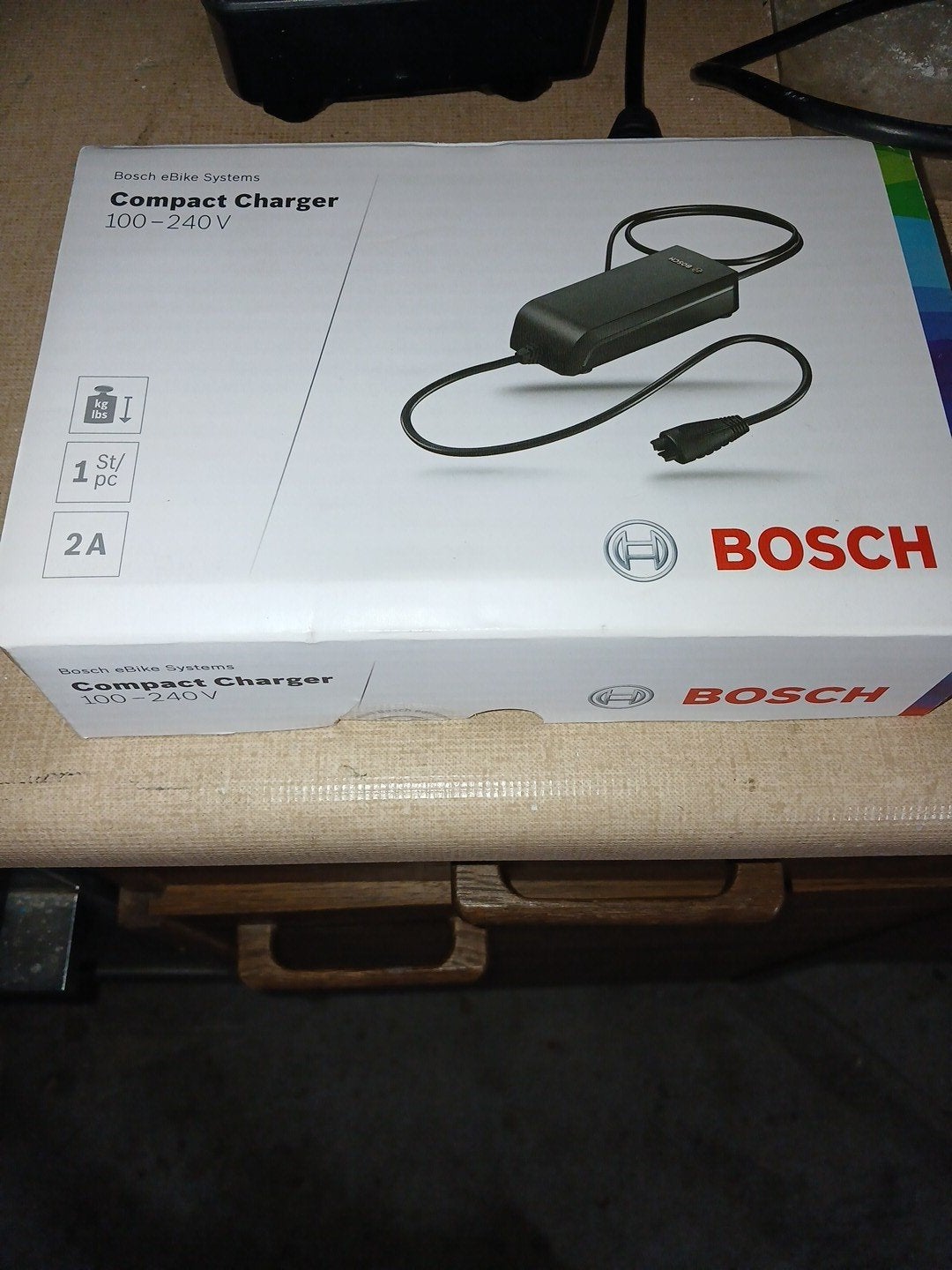 Nieuwe Bosch Compact Lader 2A voor elektrische fiets, Fietsen en Brommers, Fietsaccessoires | Fietsaccu's, Ophalen of Verzenden