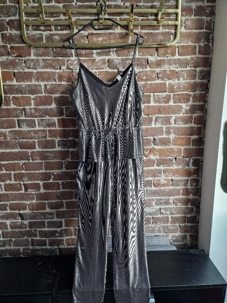 Zilveren metallic jumpsuit feest glitter H&M 40, Ophalen of Verzenden, Zo goed als nieuw, Maat 38/40 (M), Overige kleuren