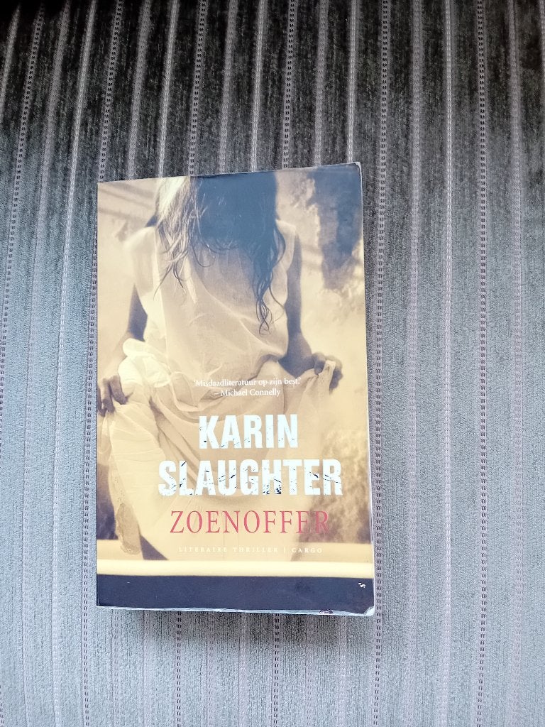 Boek - Zoenoffer - Karin Slaughter, Boeken, Ophalen of Verzenden, Zo goed als nieuw, Karin Slaughter, Amerika