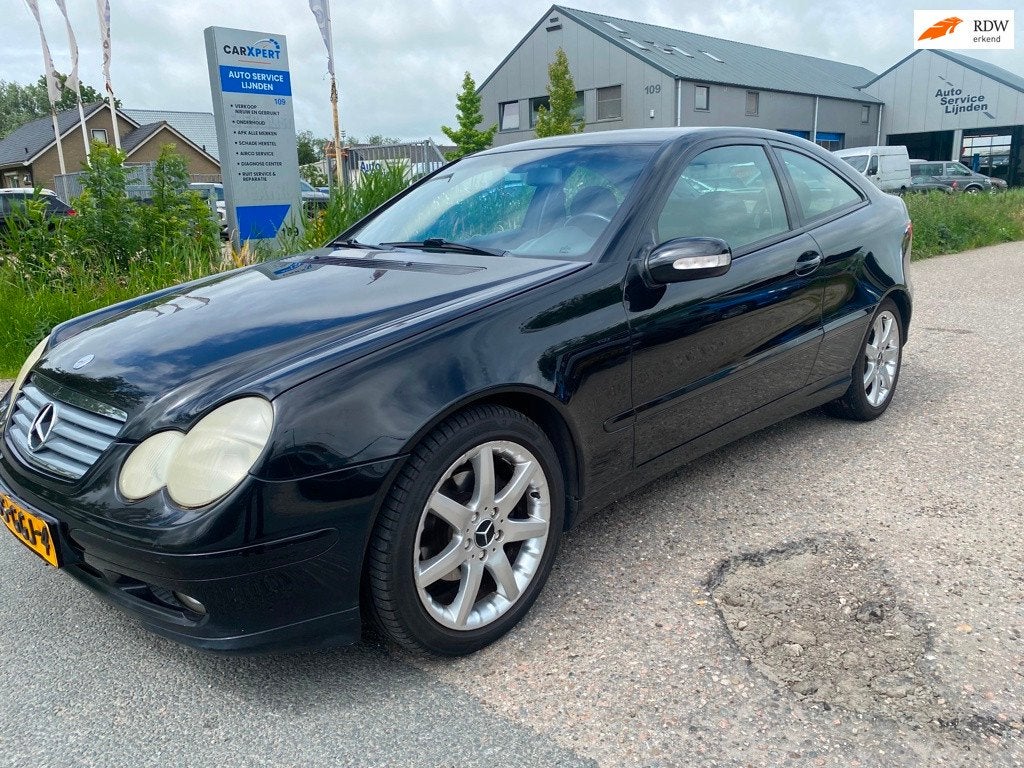 Mercedes-Benz C-klasse Sportcoupé 200 K., Keurmerk '100% Onderhouden', Gebruikt, Zwart, 4 stoelen