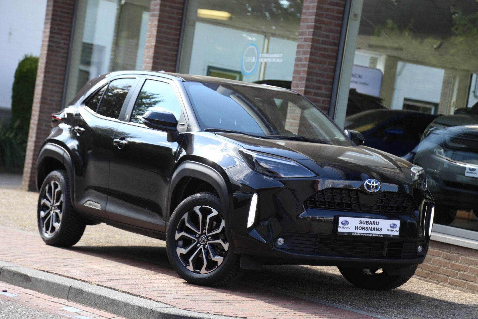 Toyota Yaris Cross 1.5 Hybrid Dynamic Team Navi LED Camera A, 12 maanden, Stof, Gebruikt, 116 pk