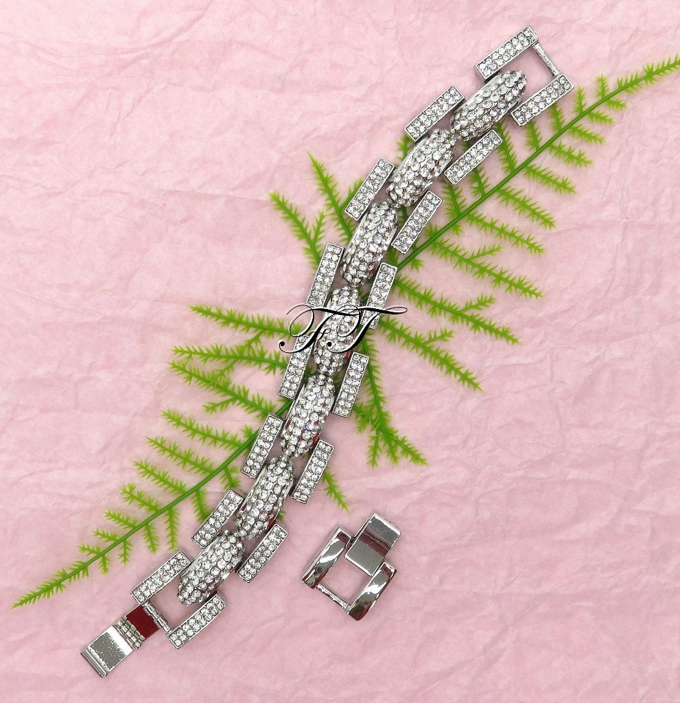 Super leuke zilvergekleurde schakelarmband met strass stenen, Sieraden, Tassen en Uiterlijk, Overige materialen, Nieuw, Ophalen of Verzenden