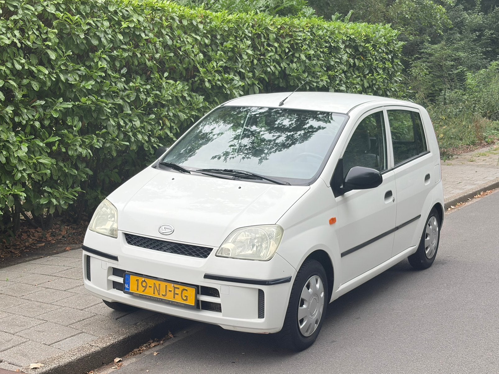 Daihatsu Cuore 1.0 5D 2003 Wit, Auto's, Daihatsu, 600 kg, Cuore, Wit, Origineel Nederlands