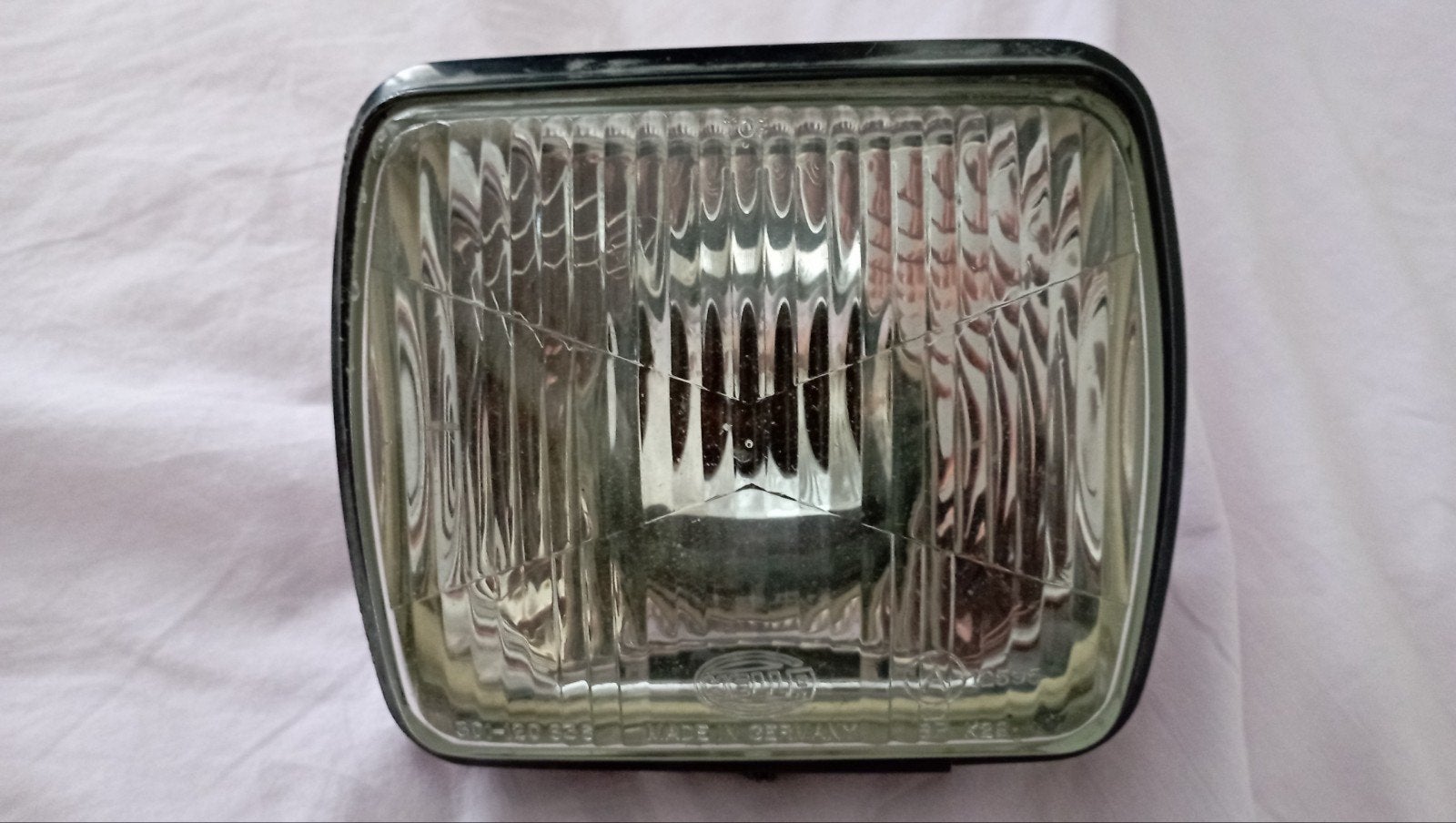 Originele Hella koplamp 529/530/540/448, Fietsen en Brommers, Ophalen of Verzenden, Zo goed als nieuw, Koplamp